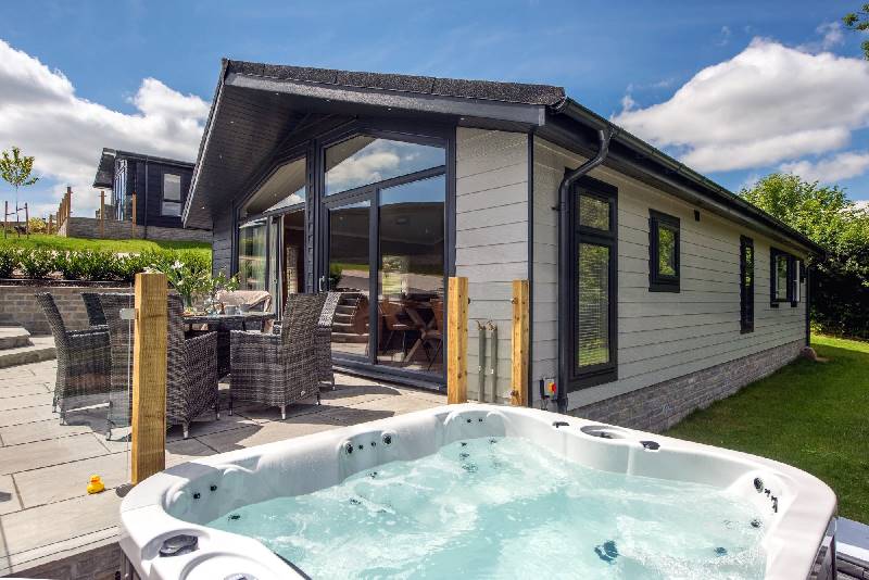 Click here for more about Saffron Lodge, 24 Roadford Lake Lodges