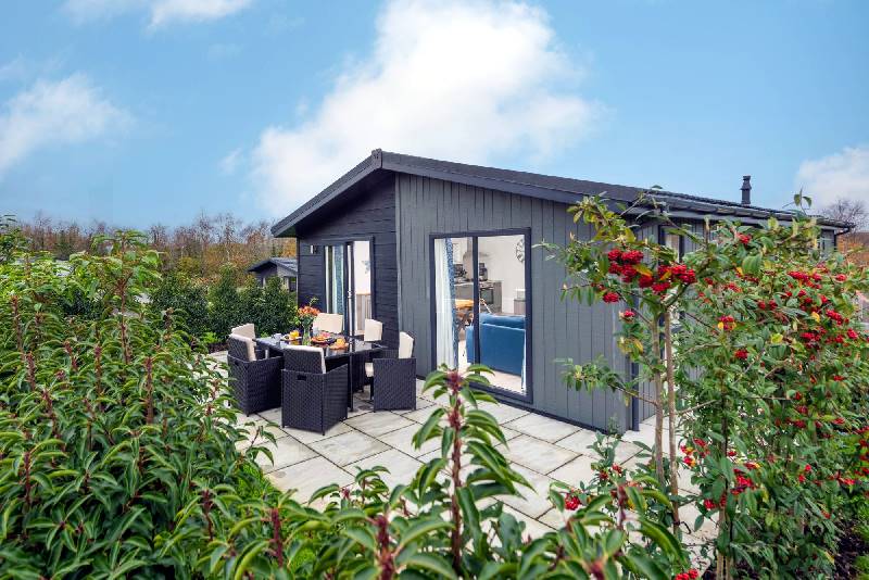 Click here for more about Bluebell Lodge, 29 Roadford Lake Lodges